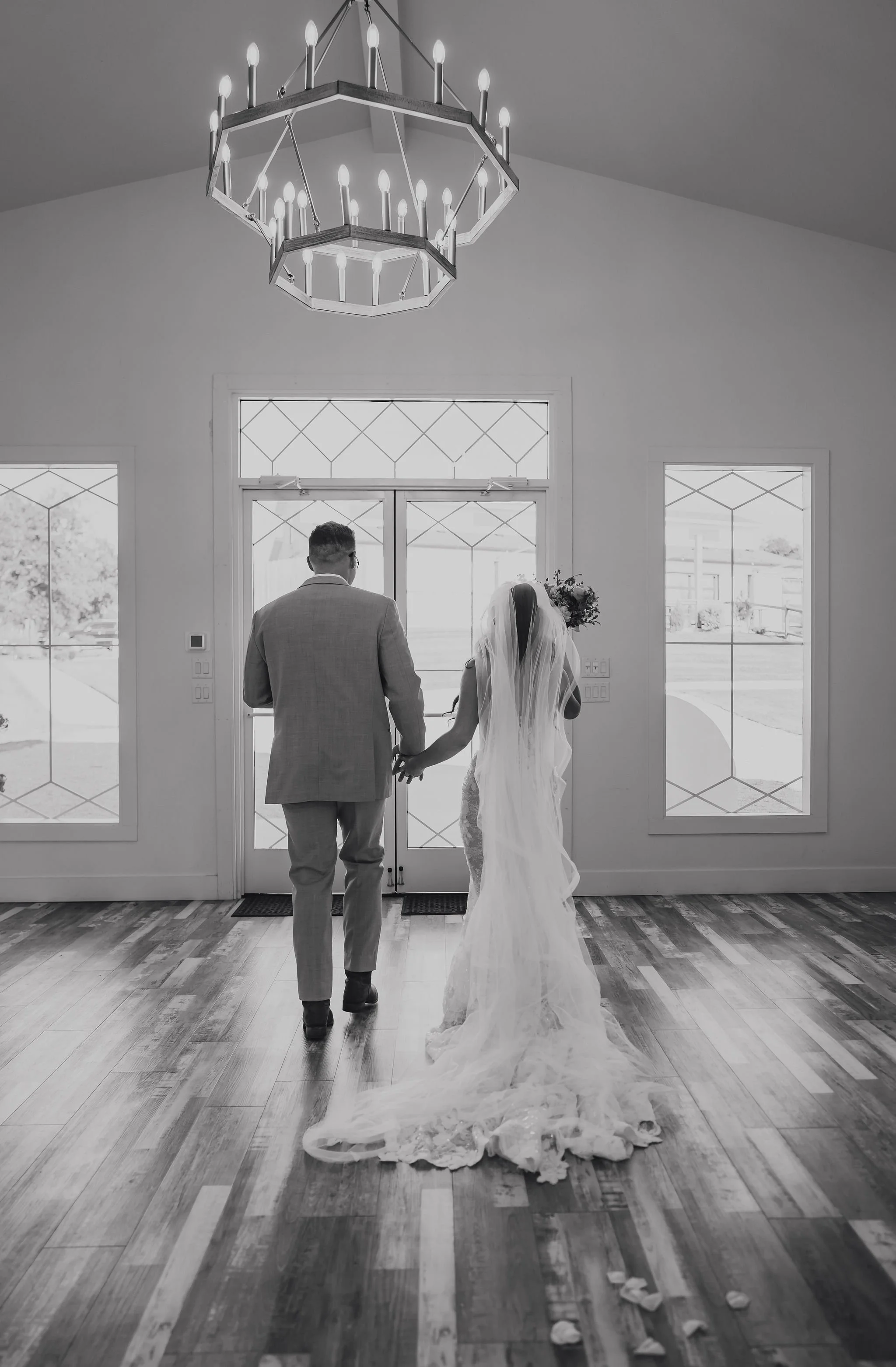 A bride and groom in the chapel at Sunset Oaks