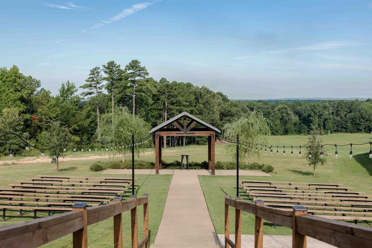 Outdoor ceremony setup at Sunset Oaks